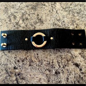 Black leather band bracelet.
